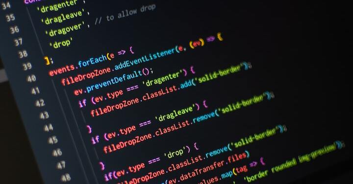 team of developers sitting at a desk